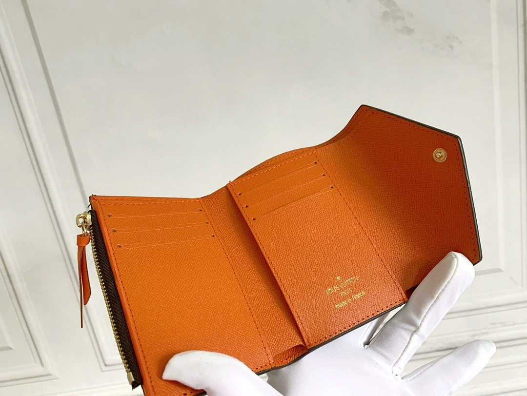 Nowe Louis Vuitton Victorine Mały portfel Pomarańczowy przycisk
