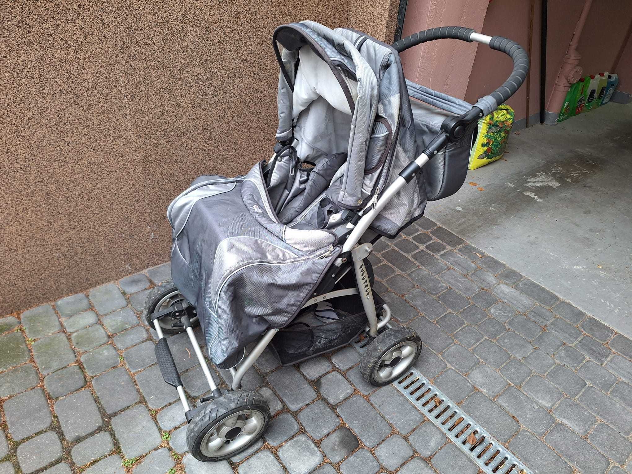 Wózek kanadyjski dla niemowlaka i dziecka siedzącego