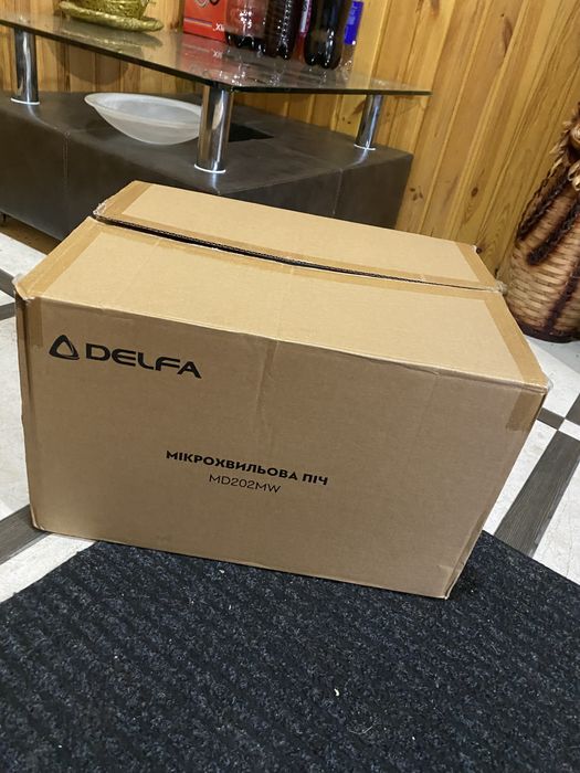 Мікрохвильова піч delfa нова