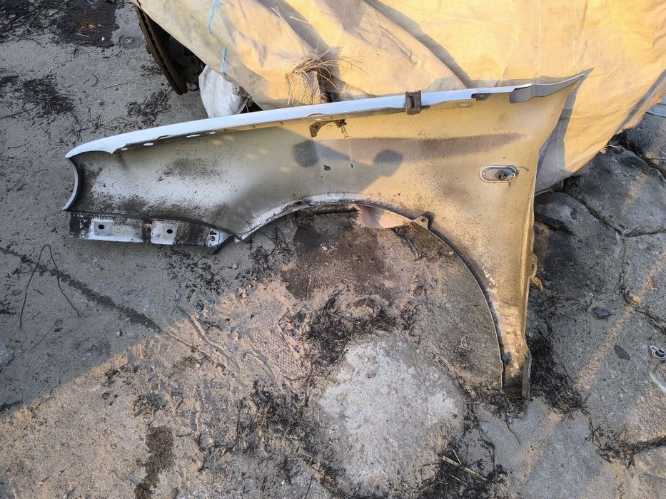 VW golf IV błotnik prawy