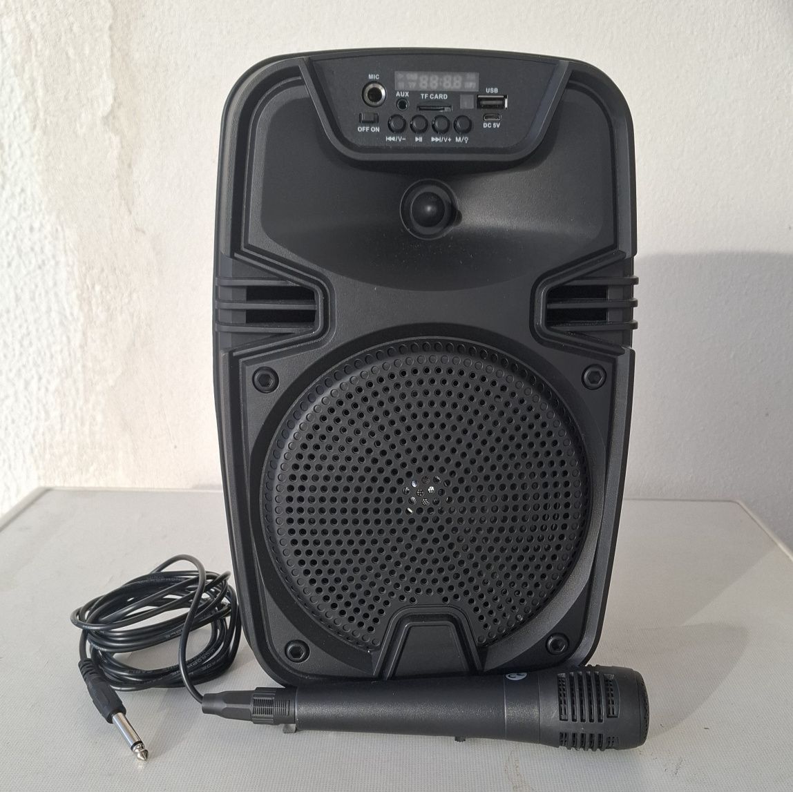 Coluna portátil com microfone