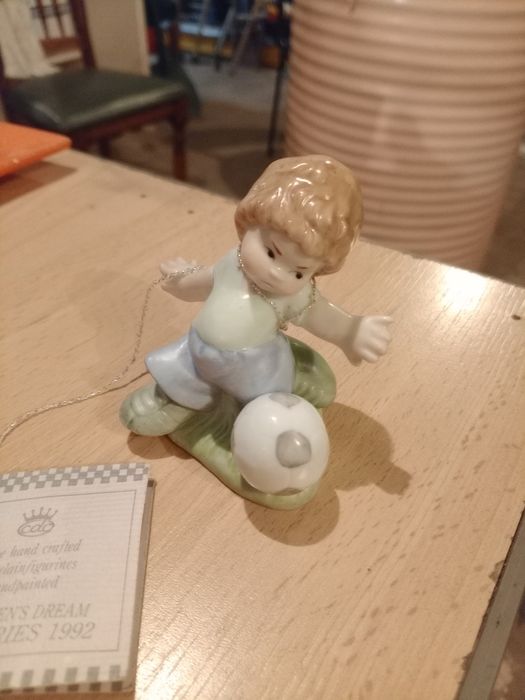 Boneco de porcelana feito á mão
