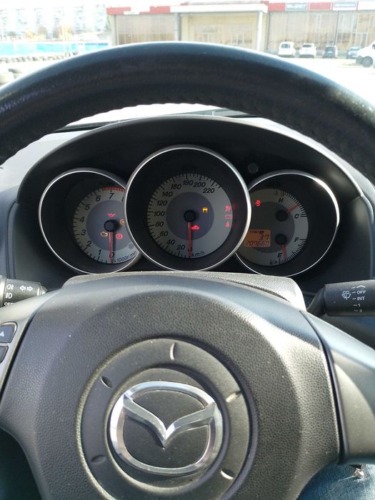 Мазда 3 хэтчбек 2006 рік