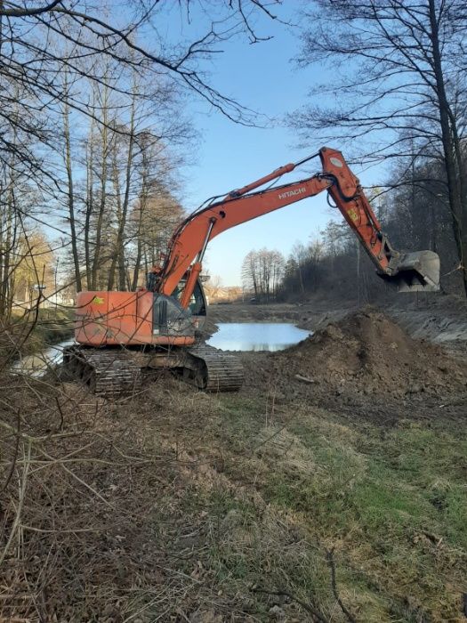 Roboty ziemne ,usługi spycharką,koparką long reach,,ładowarką