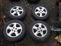 Toyota Yaris Corolla Mazda 2 DE  323 323f  Alufelgi z oponami zimowymi 15 c 4X100