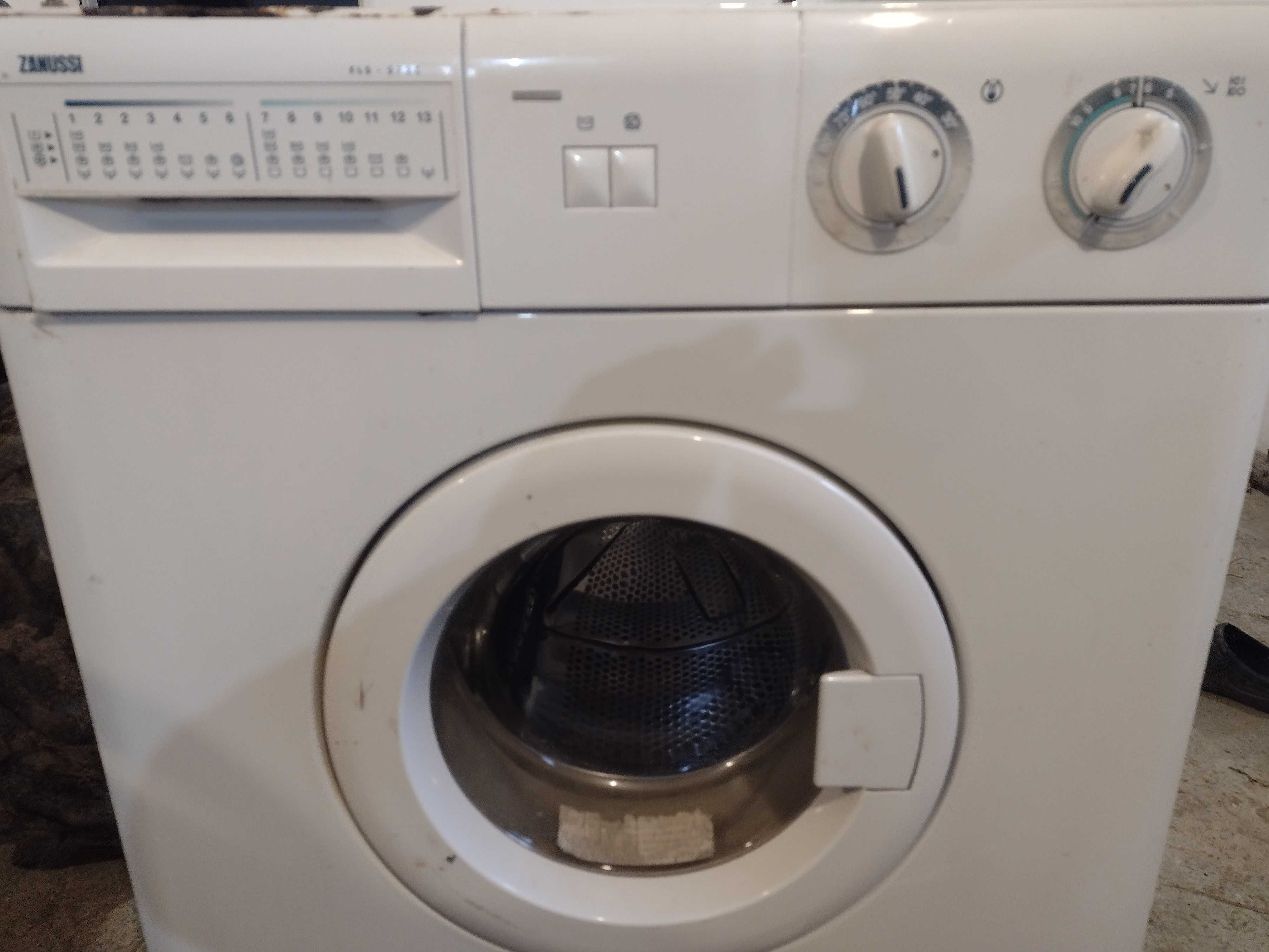 Kondensator, elektrozawór,pompa wody pralki Zanussi FLS572C