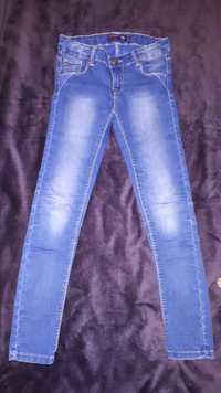 Reserved spodnie jeansowe dziewczece r 134