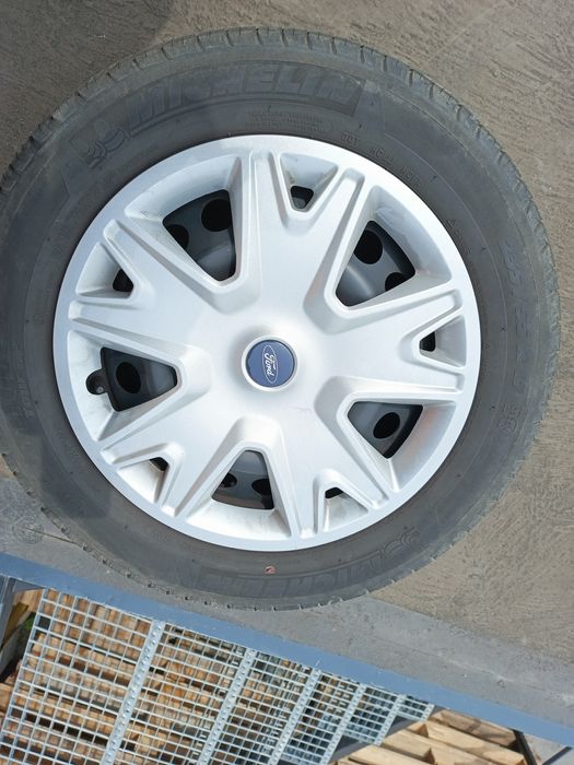 Koła letnie 235/55 17komplet z kołpakami i czujnikami tpms org. ford .