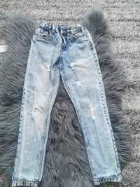 Jeansowe spodnie 128 z przetarciami