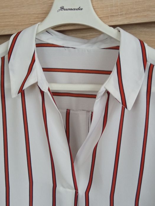 Elegancka bluzka w paseczki 46