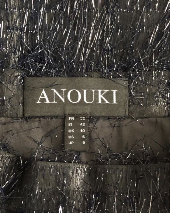 Новая спідниця Anouki з бахрамою, 38(66см талія)