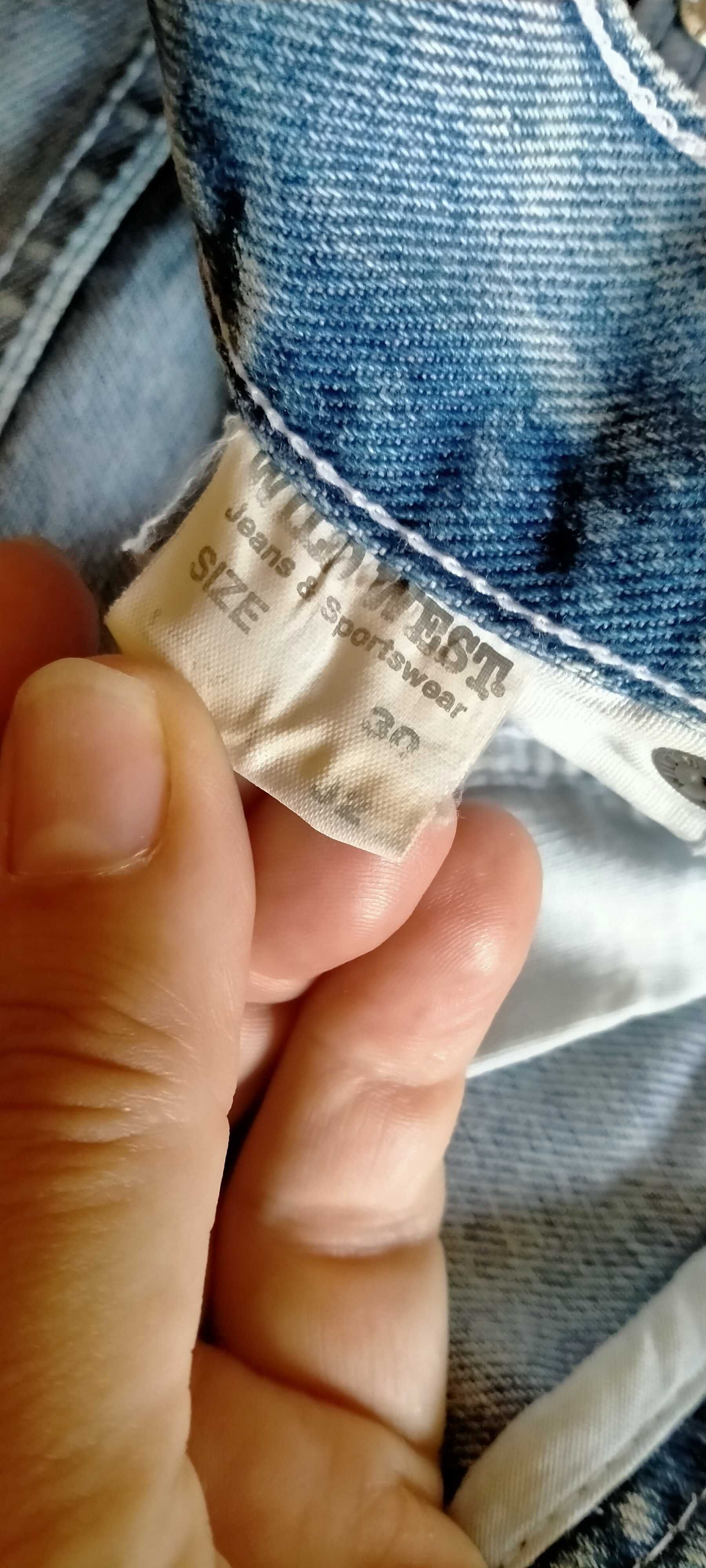 Джинсові штани .