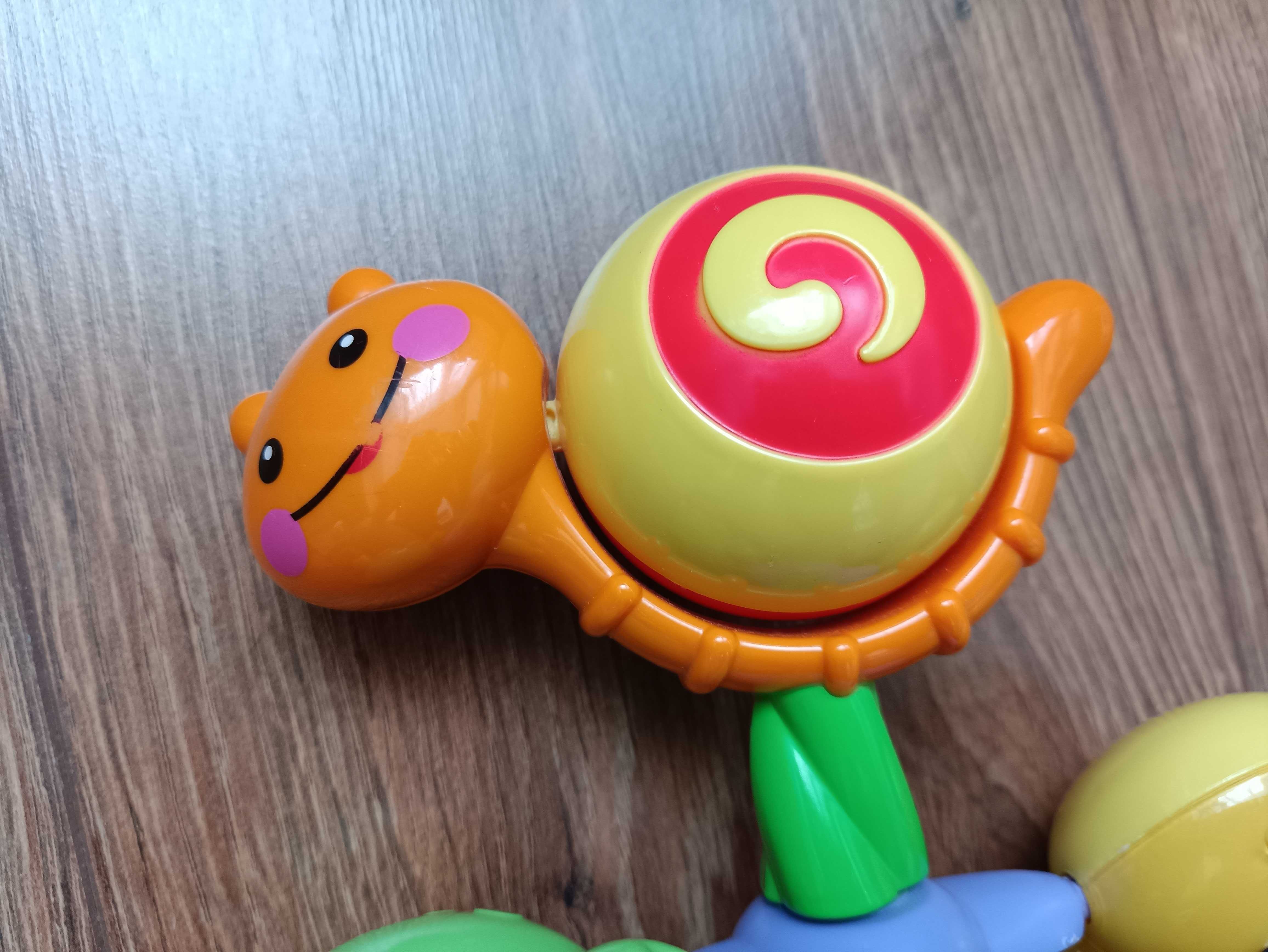 Fisher Price zabawka kręciołek z przyssawką, ślimak