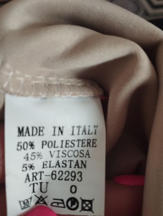 Nowe włoskie spodnie z paskiem i kieszeniami miły materiał większe