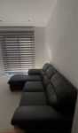 Sofa preto com chaise long