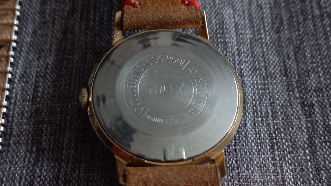 Sprzedam pozłacany męski zegarek Timex na pasku i z bransoletą