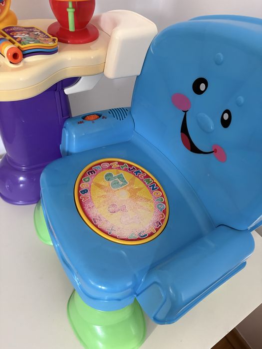 Krzesełko grające Fisher Price