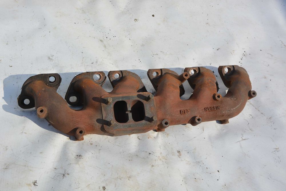 Nissan Skyline R33 RB25DET kolektor wydechowy OEM