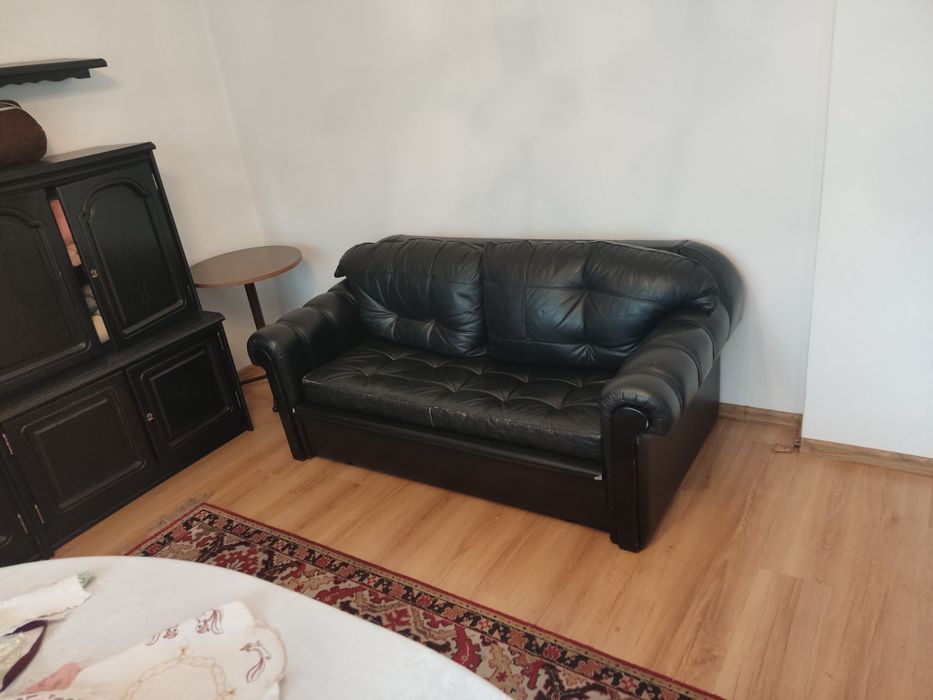 Skórzana kanapa sofa rozkladana czarna używana