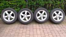 Felgi aluminiowe RIAL Kodiak i opony letnie Bridgestone Turanza t005