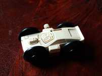 Stara zabawka samochodzik Vintage Tomy Flip Floppers wind up race car