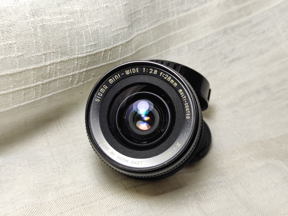 Об'єктив ширококутний Sigma 28/2.8( Olympus OM)