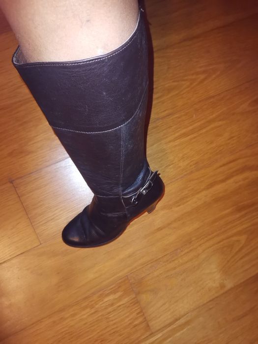 Botas cano alto pele