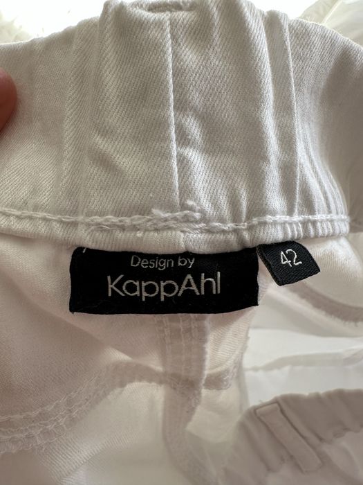 Białe spodnie z bawełny typu jeggins