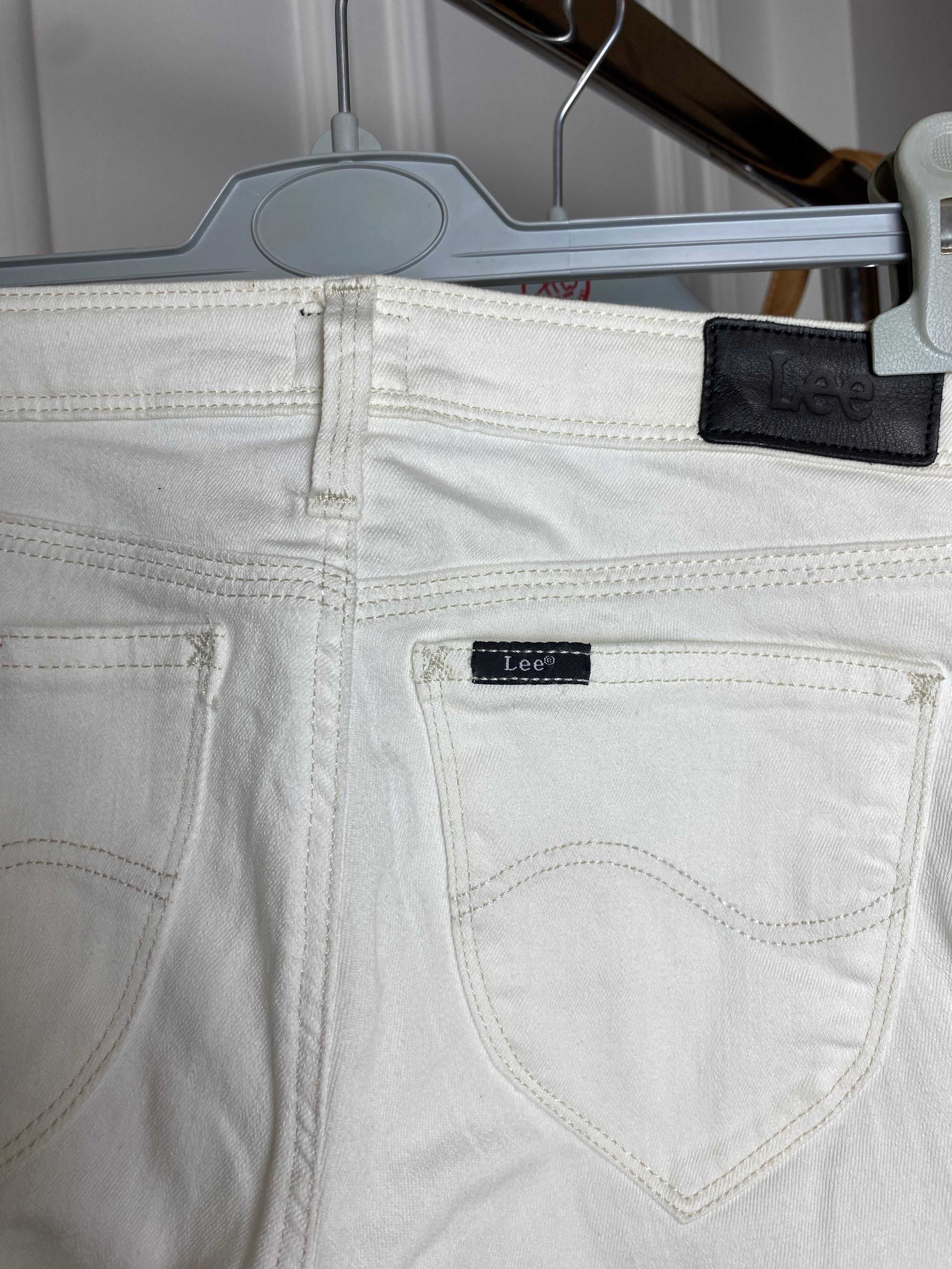 Spodnie damskie białe dżinsowe jeansowe skinny niski stan W26 L 31 Lee