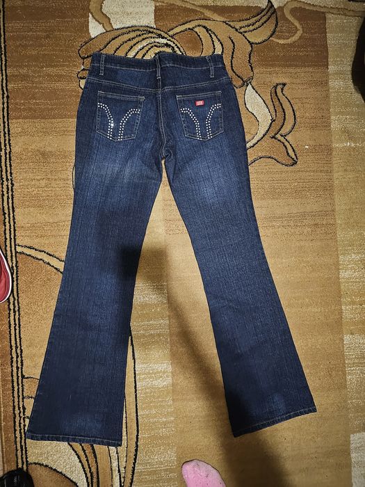 Новые джинсы клеш