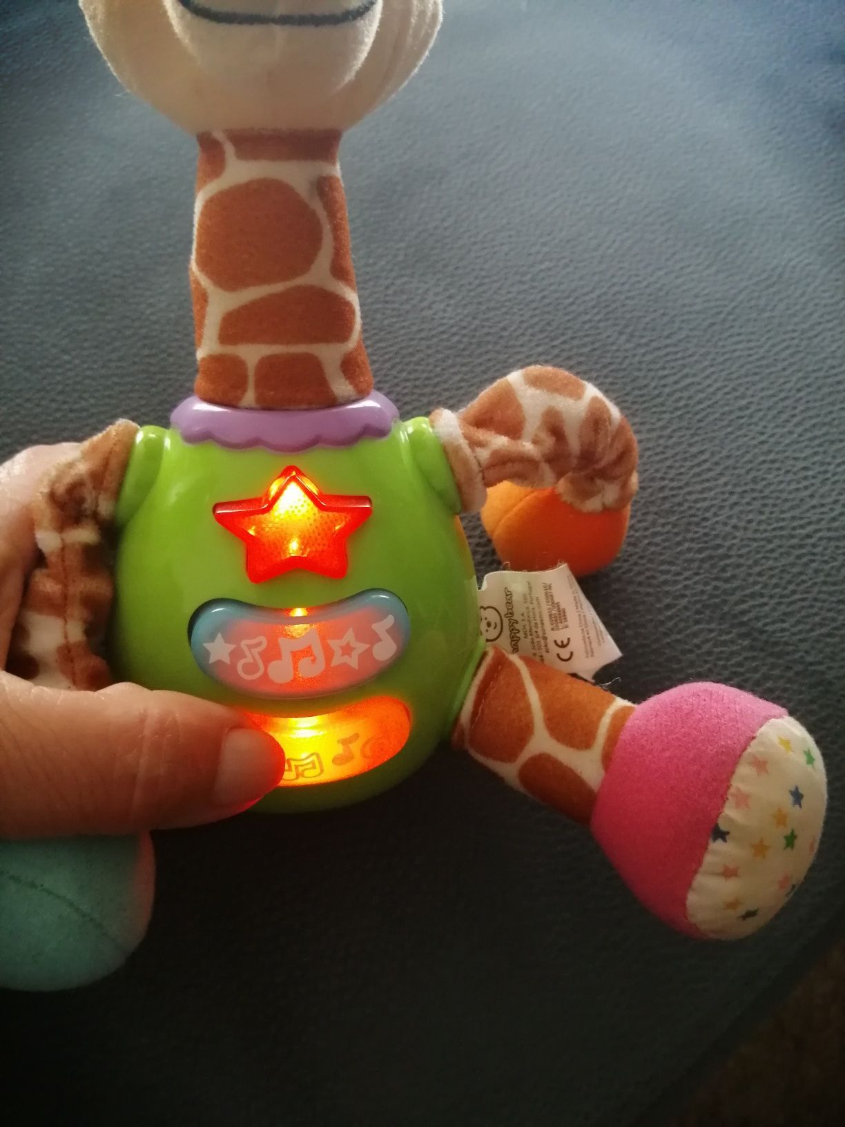 Brinquedo de bebé girafa com sons e música