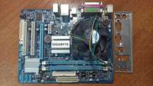 Gigabyte GA-G41M-ES2L (s775, G41, PCI-Ex16) Б.У.+Процессор+Куллер.