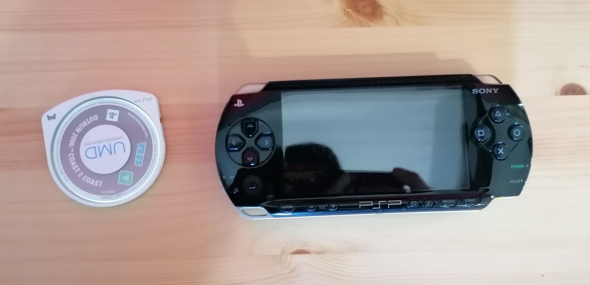 PSP com jogo em bom estado sem carregador