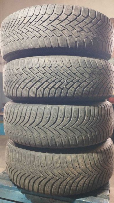 Шини зимові на дисках (комплект Audi A4) з ковпаками R15 195/65 4шт