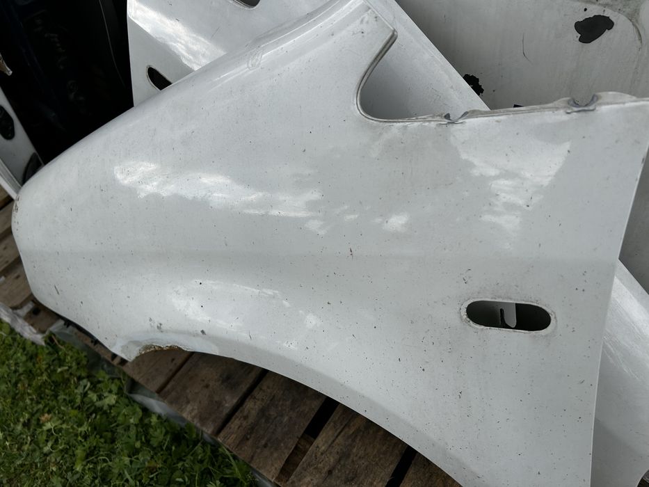 Vw Caddy III 2K Błotnik lewy przedni przód