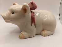 Figurka porcelanowa świnka skarbonka  z kokardą