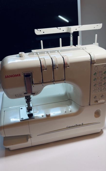 Janome CoverPro2 розпошив, розпошивальна машина.
