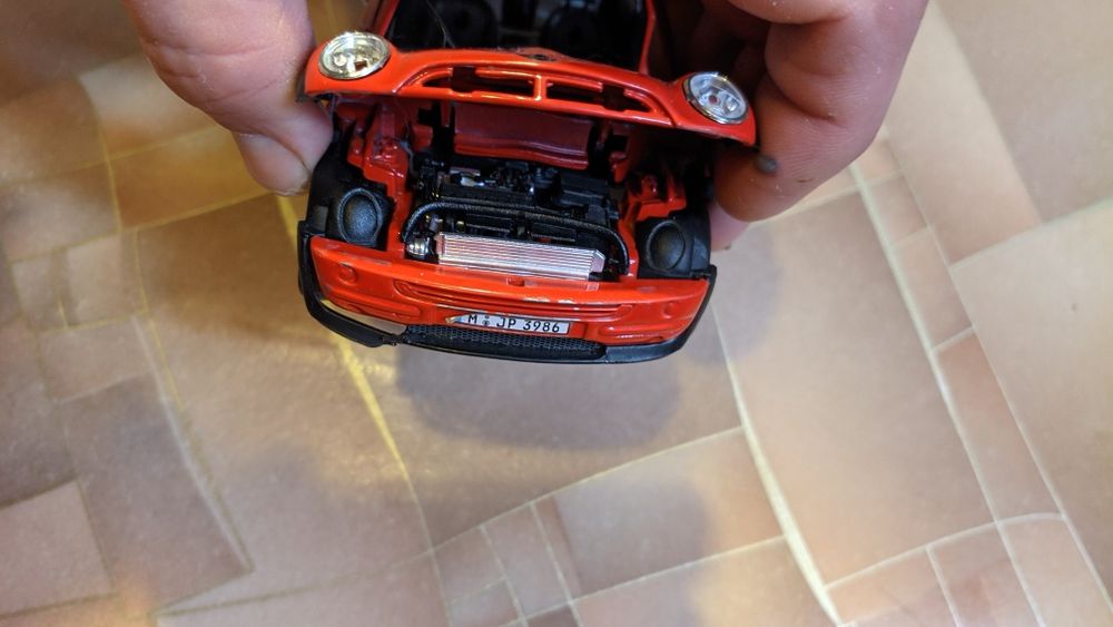 Продам модель машины Bmw Mini Cooper от Bburago,под реставрацию.