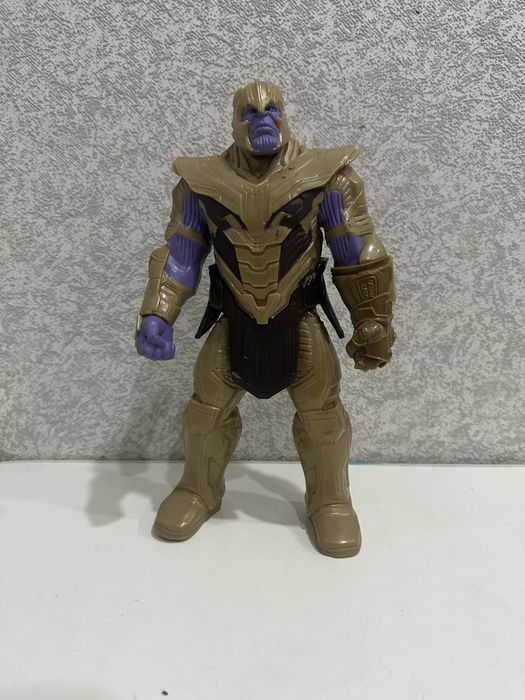 Танос марвел герой