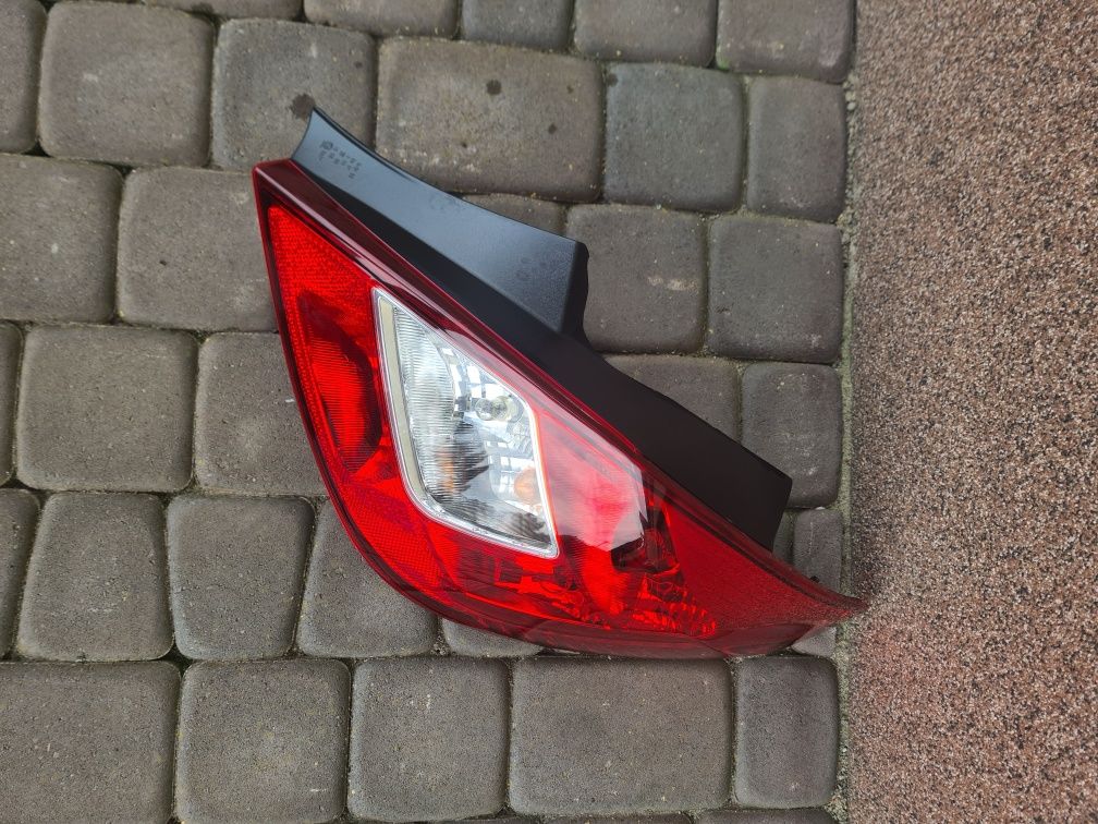 Lampa tylna tył prawa Opel Corsa D lift 5d