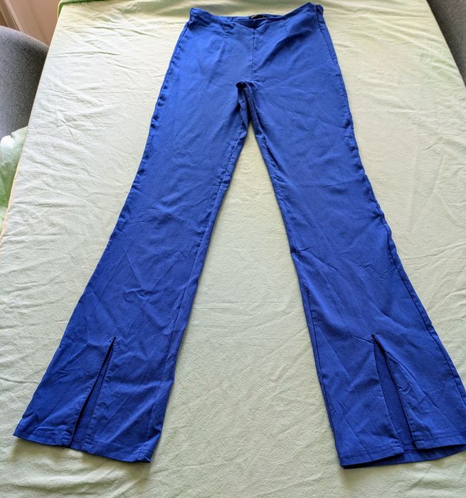 Niebieskie spodnie dzwony rozkloszowane Sinsay M 38 wiskoza