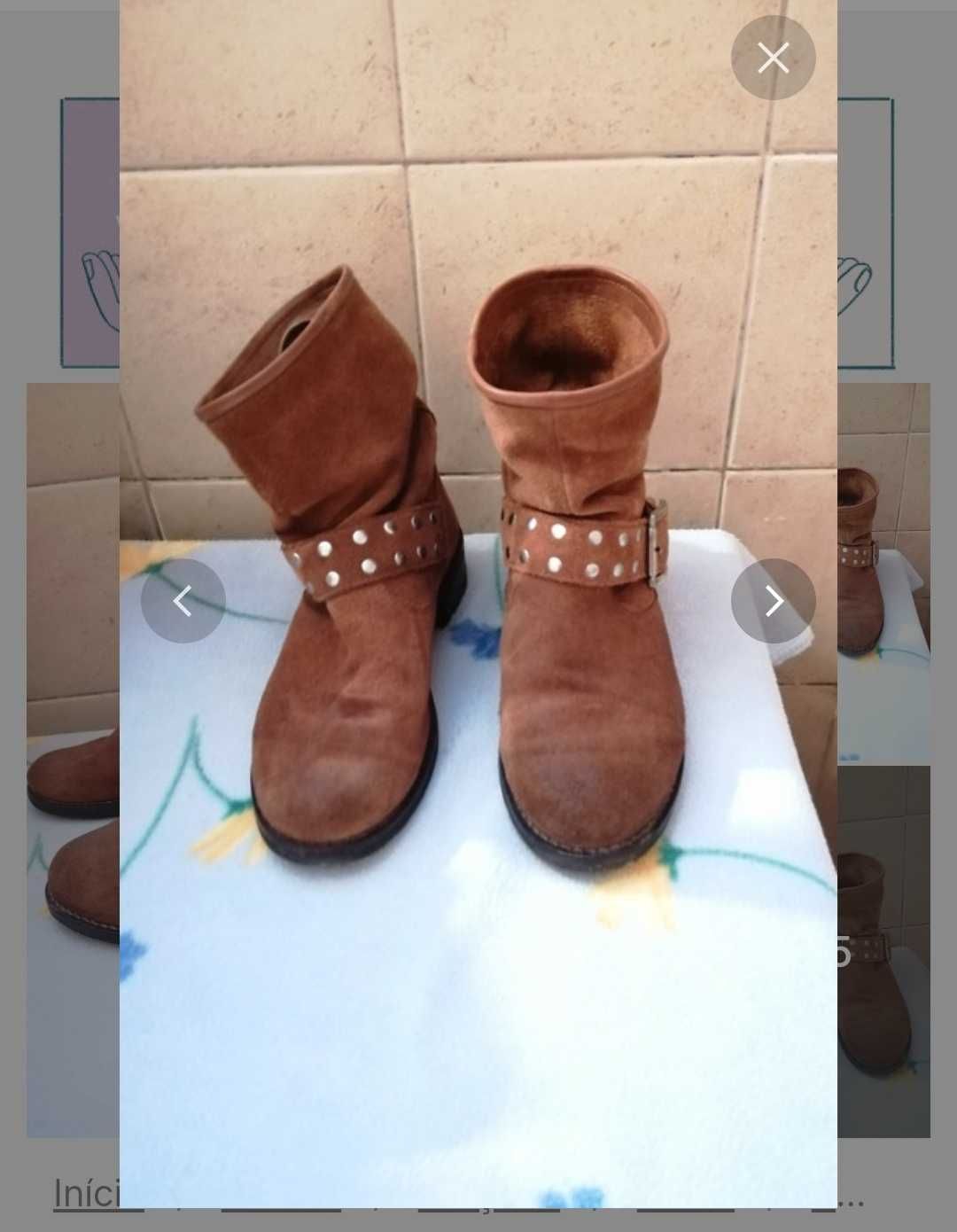 Botas em pele castanha