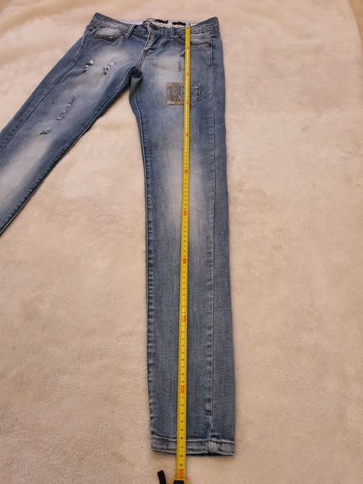 Spodnie dżinsy przetarcia Reserved W27 L32