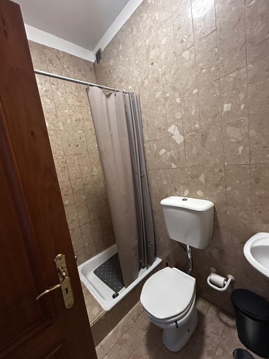 Quarto com casa de banho privativa