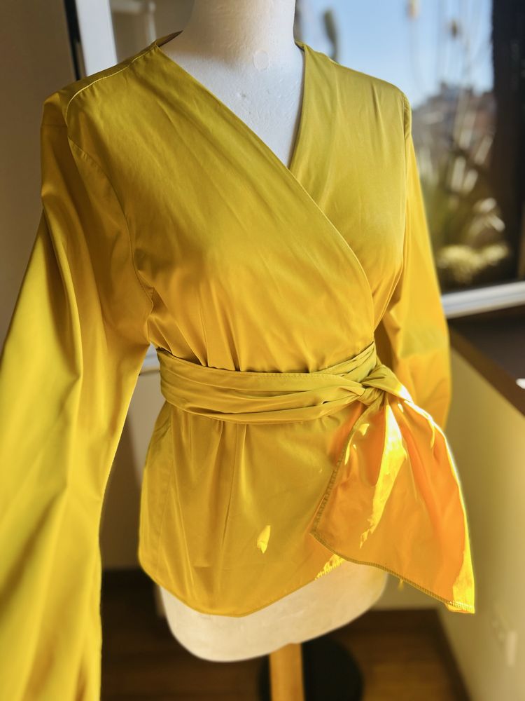 Descubra a elegância atemporal da blusa Purificación García