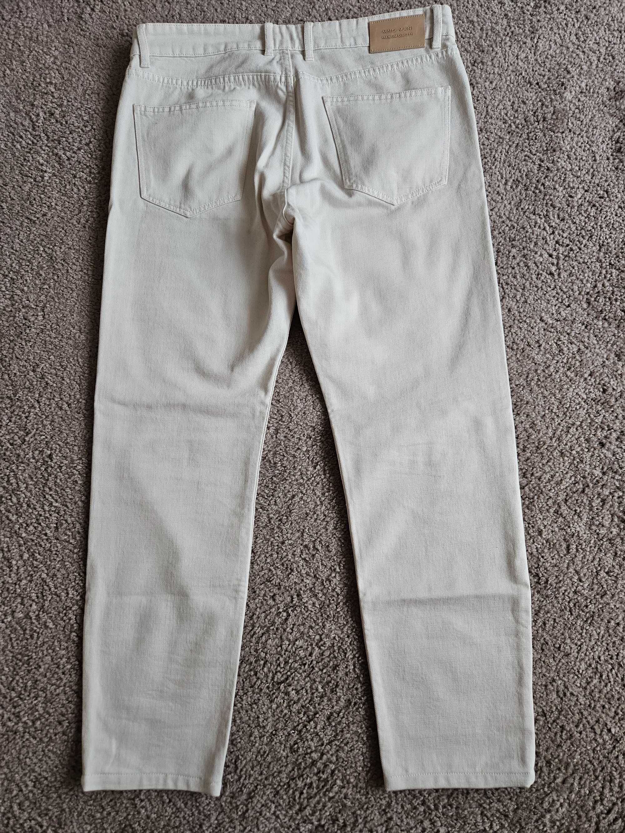 Kremowe/białe jeansy Mango Premium roz. 34