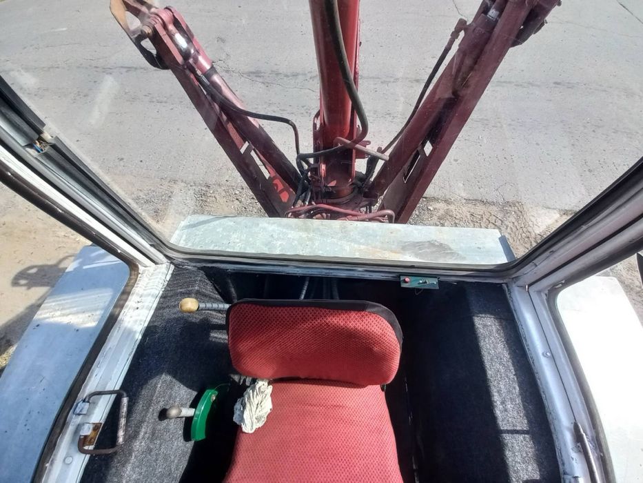 Грейферний погрузчик юмз