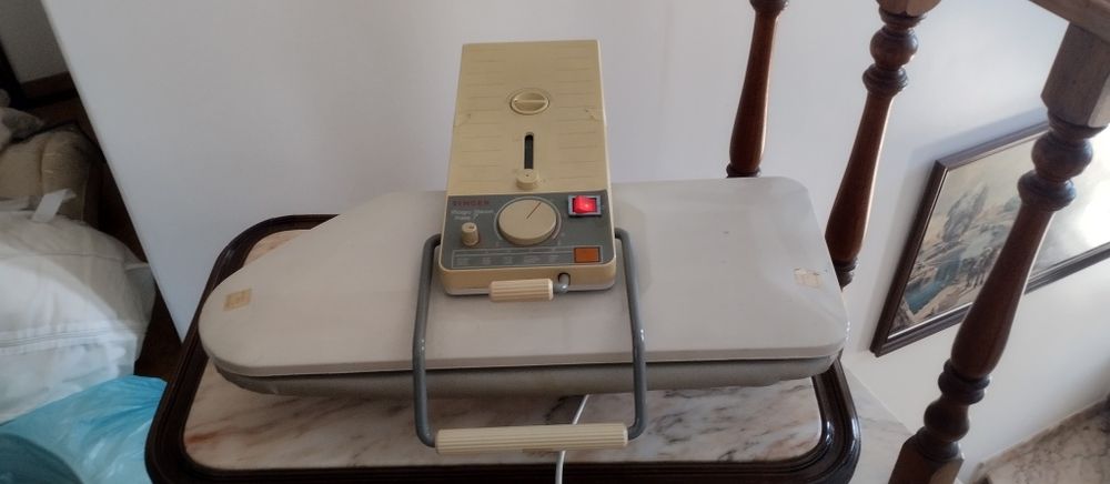 Máquina de passar a ferro