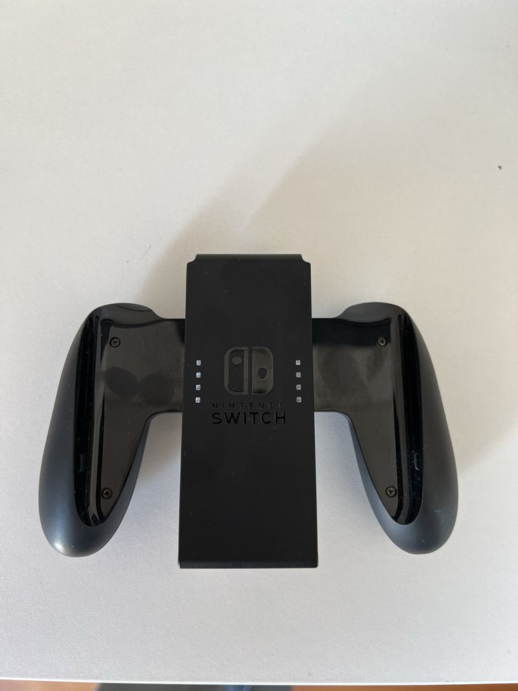 Latest Nintendo Switch model: Nintendo Switch OLED. +2 games