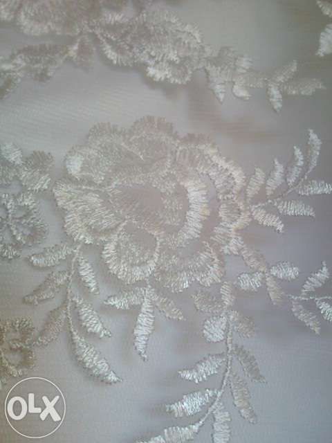 Suknia ślubna koronkowa biała